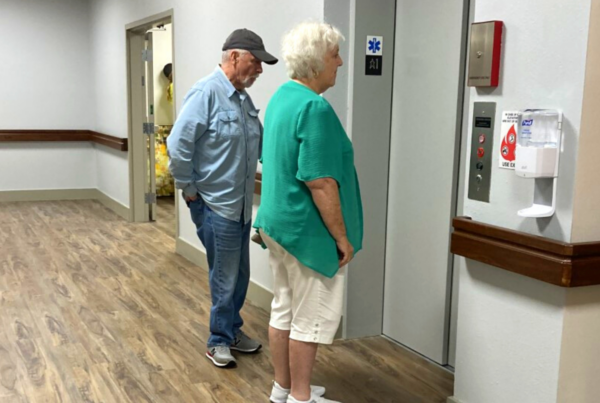 Residents entering the elevator